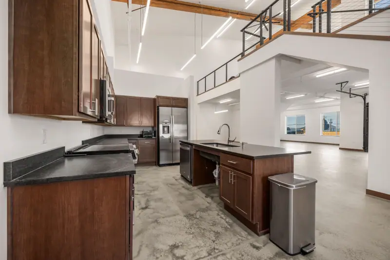 Open Kitchen Beneath Timber Beams